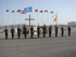 Piquete de honores legionario frente al monumento a los que dieron su vida por España  y de las banderas nacionales de la ONU, el Líbano y de las siete naciones que disponen de efectivos en la base