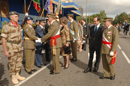 SS. MM. los Reyes de España, SS. AA Reales los Principes de Asturias, y las Infantas con sus respectivos conyuges, saludan a los jefes de las unidades que momentos antes desfilaron por el Paseo de la Castellana