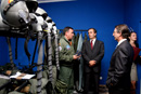 El ministro de Defensa, José Antonio Alonso, y el teniente coronel del EA,Francisco Javier Cid, jefe del destacamento Haris en la Base Aérea de Siauliai, Lituania, con el embajador de España en Lituania Fidel López